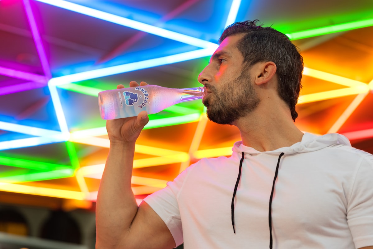 Man reviewing supplement ingredients and labels